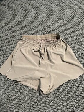 lululemon athletica women's athletic shorts - beige Sz 4